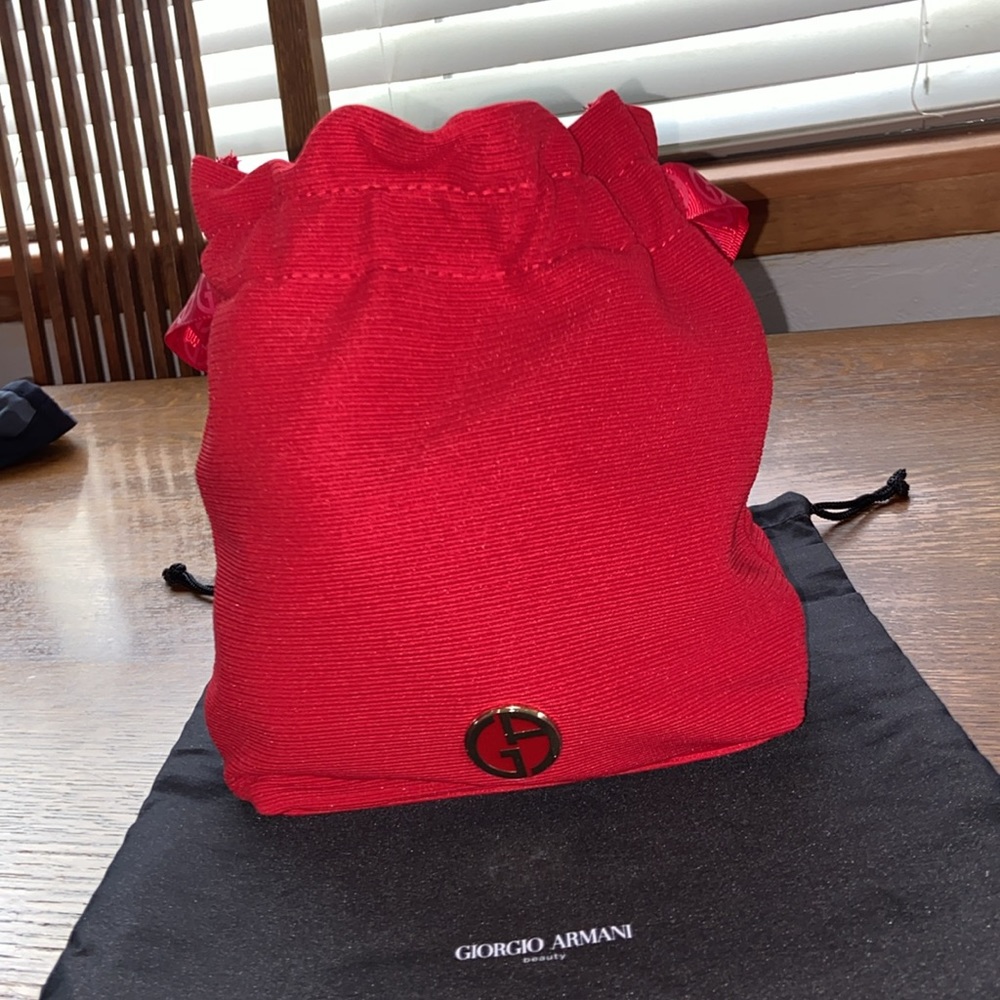 Giorgio Armani NWT red beauty bag with dust bag.
